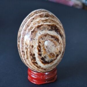 Natural Stone Decorative Egg on Red Stand